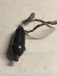Interruptor tipo pera baqueita botón grana Vetto. Años 40