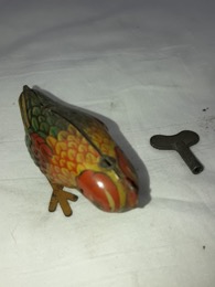 Pajarillo de hojalata litografiada con sistema de cuerda