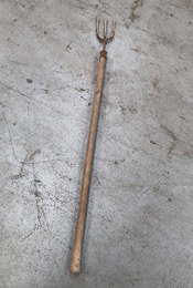 Pequeño tridente agricola