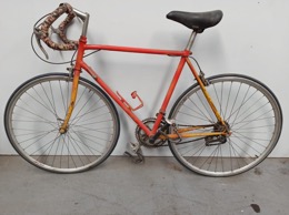 Bicicleta carretera naranja | ⦵ 57 cm | Años 80