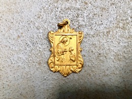 Medalla religiosa latón