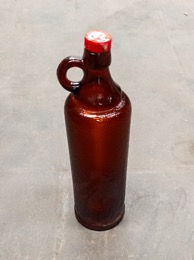Botella_ Envase ginebra GIN XORIGUER vidrio ambar.