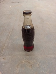 Botellín 33 cl Coca-Cola en relieve | Años 60